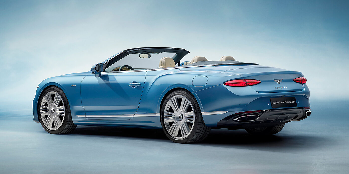 Bentley Roma New Bentley Continental GTC Azure convertible rear view in Light Windsor blue paint with 22 inch ten spoke wheels and chrome exterior details